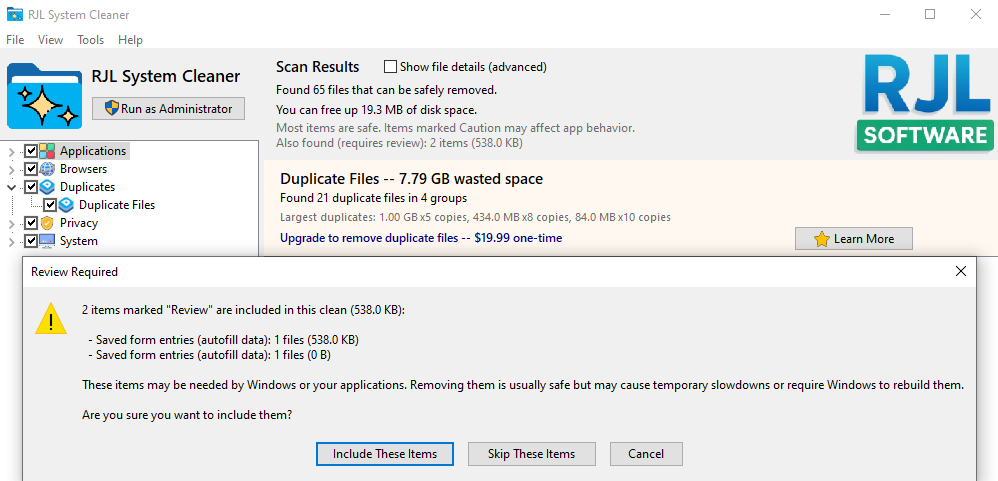 RJL System Cleaner Review Required dialog warning that 2 items marked Review totaling 538 KB may be needed by Windows, with buttons to include them, skip them, or cancel the clean entirely